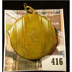 5 year disc-style mechanical calendar, 1941-1946, with knife and nail file, engraved with cursive RJ