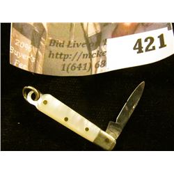 Miniature pocket knife with mother of pearl handle, blade marked GERMANY, total length 2”, blade len