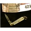 Image 2 : Miniature pocket knife with mother of pearl handle, blade marked GERMANY, total length 2”, blade len