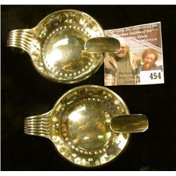 (2) (Silver? Platinum?) Cartier ashtrays, marked CARTIER RL 950 M MADE IN FRANCE. Scarce, heavy, 113