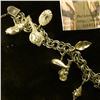 Image 3 : 8” silver double ring link charm bracelet with 14 shells and whales sterling charms. Well made with 