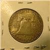 Image 2 : 1001 . 1949 Franklin Half Dollar, BU, reverse album toned, value $7
