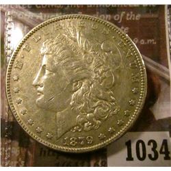 1034 . 1879 Morgan Silver Dollar, AU, value $40