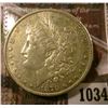 Image 1 : 1034 . 1879 Morgan Silver Dollar, AU, value $40