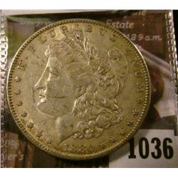 1036 . 1880-O micro O Morgan Silver Dollar, AU, value $48