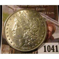 1041 . 1885 Morgan Silver Dollar, AU+, light wear, value $39