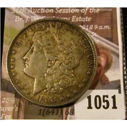 1051 . 1898 Morgan Silver Dollar, BU toned, full breast feathers, c