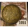Image 1 : 1051 . 1898 Morgan Silver Dollar, BU toned, full breast feathers, c