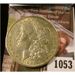 1053 . 1899-O Morgan Silver Dollar, XF+, value $37