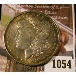 1054 . 1900-O Morgan Silver Dollar, AU toned, reverse has old bulls