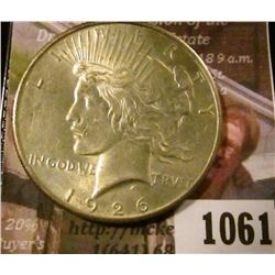 1061 . 1926 Peace Silver Dollar, AU, value $37