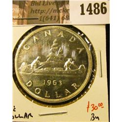 1486 . 1963 Canada Silver Dollar, BU, value $30+