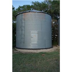 2300 BUSHEL BUTLER GRAIN BIN WITH AIR FAN ON CEMENT NO FLOOR. BINS ARE LOCATED IN RM OF MILDEN. TRAV