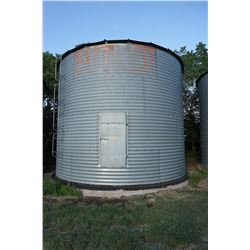 2300 BUSHEL BUTLER GRAIN BIN WITH AIR FAN ON CEMENT NO FLOOR. BINS ARE LOCATED IN RM OF MILDEN. TRAV
