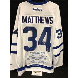 AUSTON MATTHEWS SIGNED REEBOK LEAFS JERSEY INSCRIBED "100TH CAREER NHL POINT" W/ FRAMEWORTH COA