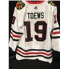 Image 1 : JONATHAN TOEWS SIGNED BLACKHAWKS JERSEY W/ FRAMEWORTH COA