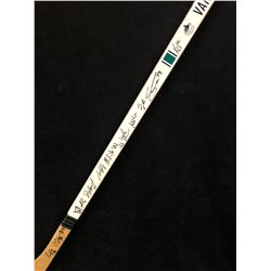 VANCOUVER CANUCKS TEAM SIGNED HOCKEY STICK (WILLIE MITCHELL, DANIEL & HENRIK SEDIN & MORE)