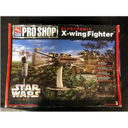 AMT/ERTL PRO SHOP STAR WARS ELECTRONIC X-WING FIGHTER MODEL KIT (UNASSEMBLED)