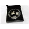 Image 2 : CASE OF CRYSTAL RHINESTONE BRACELET AND RING AND EARRINGS