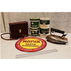 Box of Vintage Misc (Tobacco Tins, Binoculars, Sad Iron, Chrysler Sign)