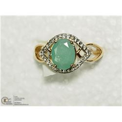 35) SILVER EMERALD AND CUBIC ZIRCONIA RING