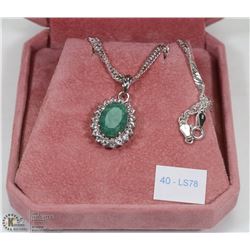 40) SILVER LARGE EMERALD AND SIDE TOPAZ NECKLACE