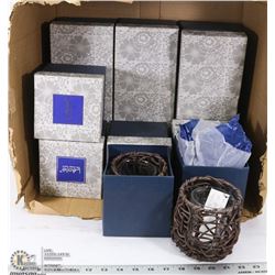 BOX OF CANDLE HOLDERS