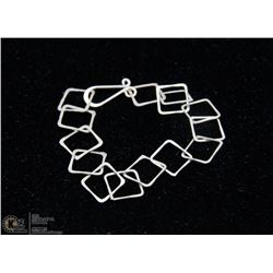STERLING SILVER GEOMETRIC BRACELET.