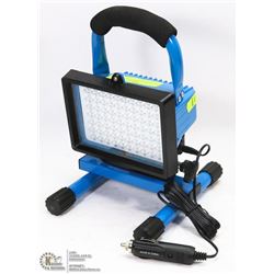 MINI WORK LIGHT ON SWIVEL BASE. HAS ADAPTOR