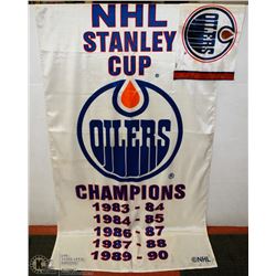 2 VINTAGE OILER FLAGS.
