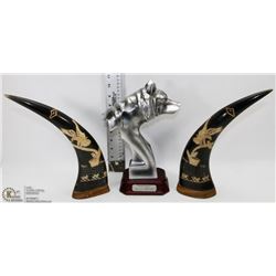 PAIR OF HAND CARVED HORNS PLUS WOLF CARVING.