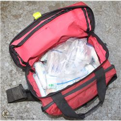 FIRST AID KIT IN RED CARRYING CASE