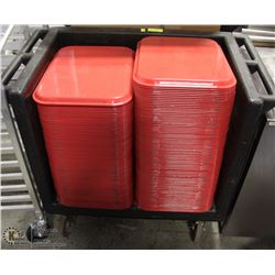 PUSH CART FULL OF RED TRAYS