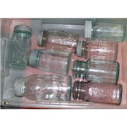PLASTIC TOTE OF 8 ANTIQUE CANNING JARS.