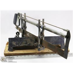 OLD MITRE SAW.