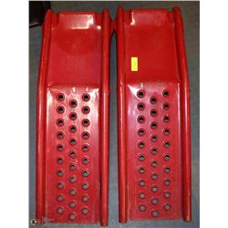 ONE SET OF RED METAL CAR RAMPS.