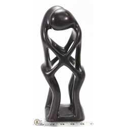 HEAVY EMBRACING COUPLE FIGURINE,