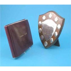 A 'Prince of Wales Angling Society' oak trophy shield with plated presentation mounts, and a rela...