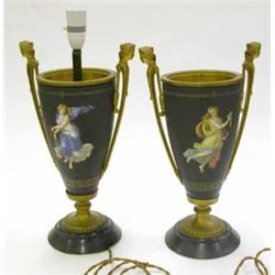 A pair of French Empire style lamp bases, slender urn shaped with ormolu vmounts and cast caryati...