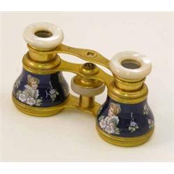 A pair of blue enamelled opera glasses, decorated with pink posies 4ins...