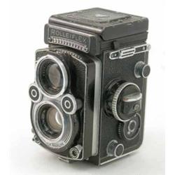 A Rolleiflex twin lens reflex camera, with a Carl Zeiss Planar 75mm lens 5.5ins...