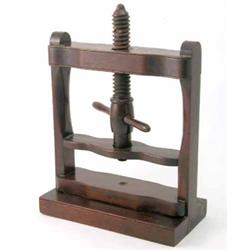 A mahogany book press, with capstan style screw handle 13 ins...