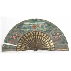 A Cantonese fan, having floral gilded and rust-red lacquered sticks and guards and a painted pape...