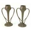 Image 1 : A pair of Liberty Tudric pewter tulip vases, with two elongated crossover handles, marked 029 on...
