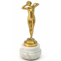 L. Ouri. a gilt bronze figure 'Premier Frisson', modelled as a stretching nude woman, signed on m...