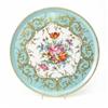 Image 1 : A 19th century French porcelain tray, circular, painted with flowers within a gilded bleu celeste...