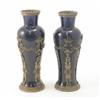Image 1 : A pair of gilt metal mounted baluster vases, in blue glazed earthenware, mounts in neo-classical...