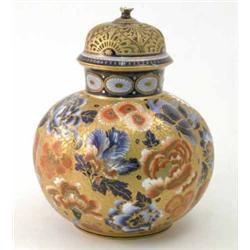 A late Victorian Royal Crown Derby vase and cover, globular, painted with flowers in blue and red...