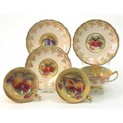 A set of six Paragon cups and saucers, printed and painted with fruit, signed J. Martin, pattern...