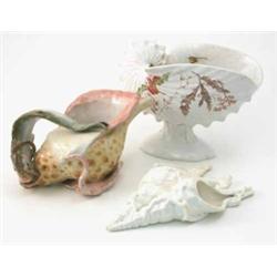 A Royal Worcester wall pocket, formed as two conch shells, date code 1883 (10in.), a Wedgwood pla...